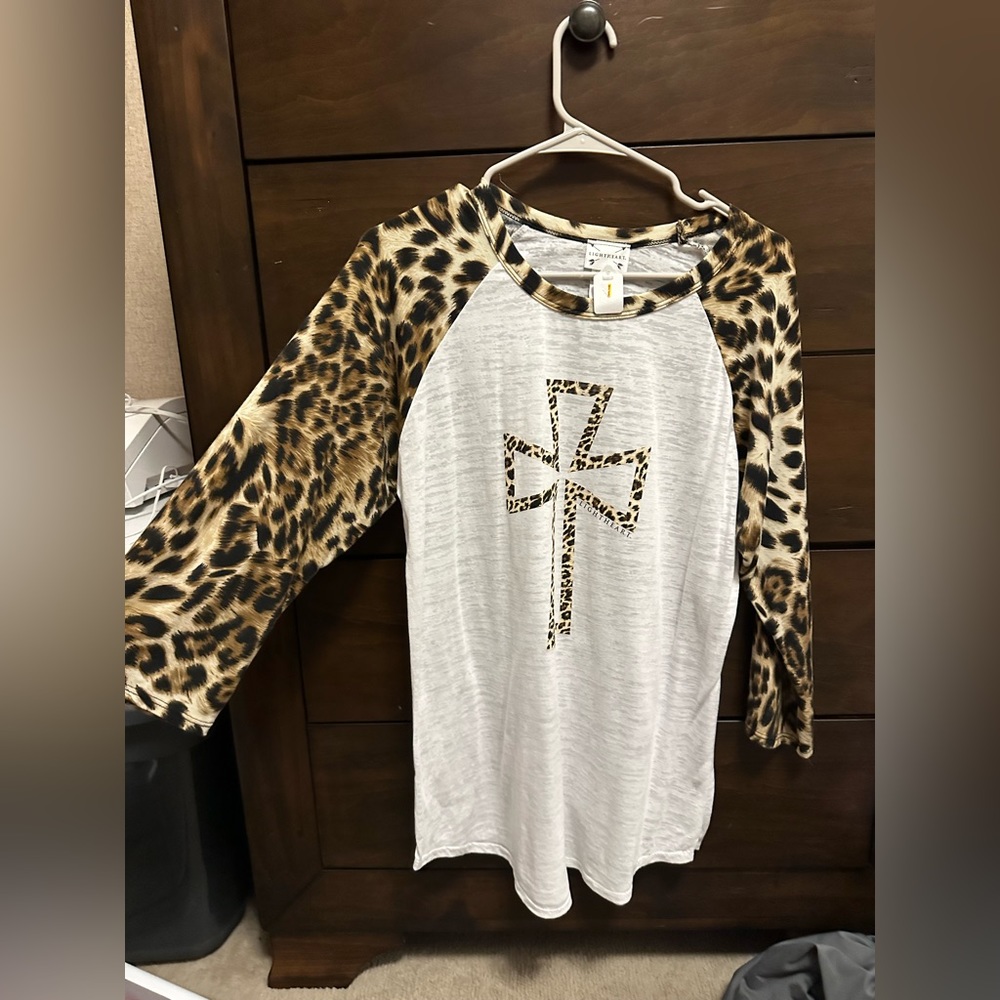 Lightheart leopard cross top. New with tags!